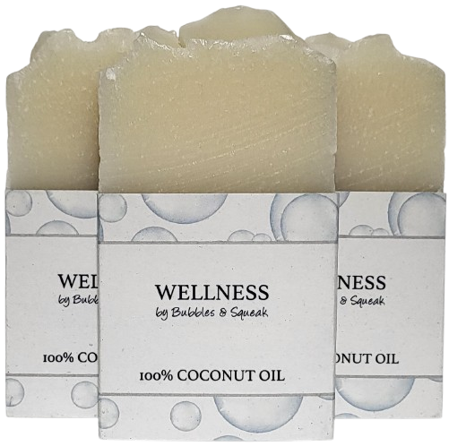 Three bars of just soap100% coconut oil, one in front of two others, no background