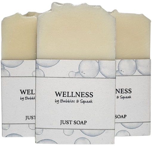 Three bars of just soap, one in front of two others, no background