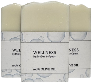 Three bars of just soap 100% olive oil, one in front of two others, no background