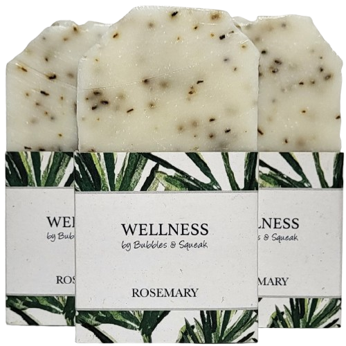 Three bars of just soap rosemary, one in front of two others, no background