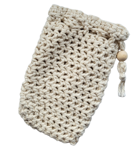 two jute and  two cotton soap saver bags arranged alternately in a fan