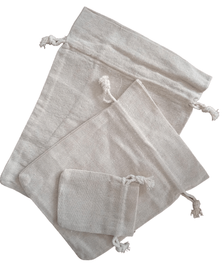 Three different size linen bags with tie tops